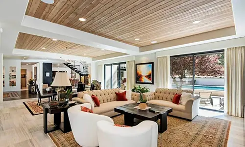 A living room with glass doors