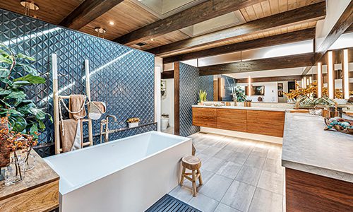 A bathroom with a modern and rustic design